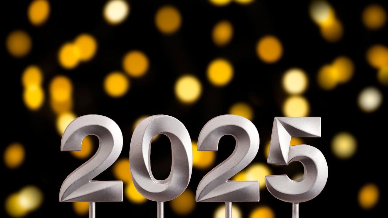 Landlord Today logo with 2025 celebration theme and golden bokeh background.