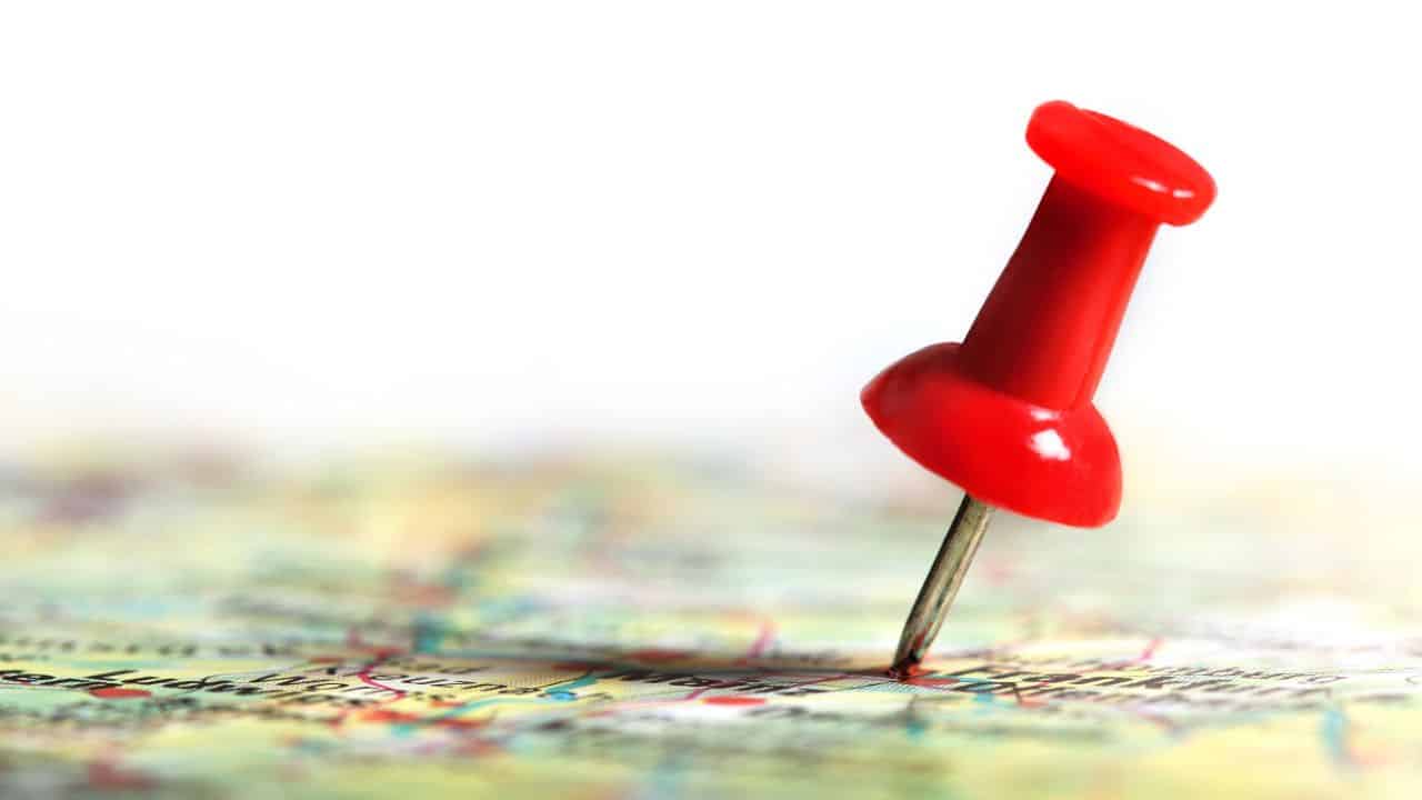Red pushpin marking a location on a rental property map.
