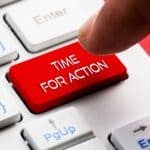 Red 'Time for Action' button on a keyboard for landlord advice.